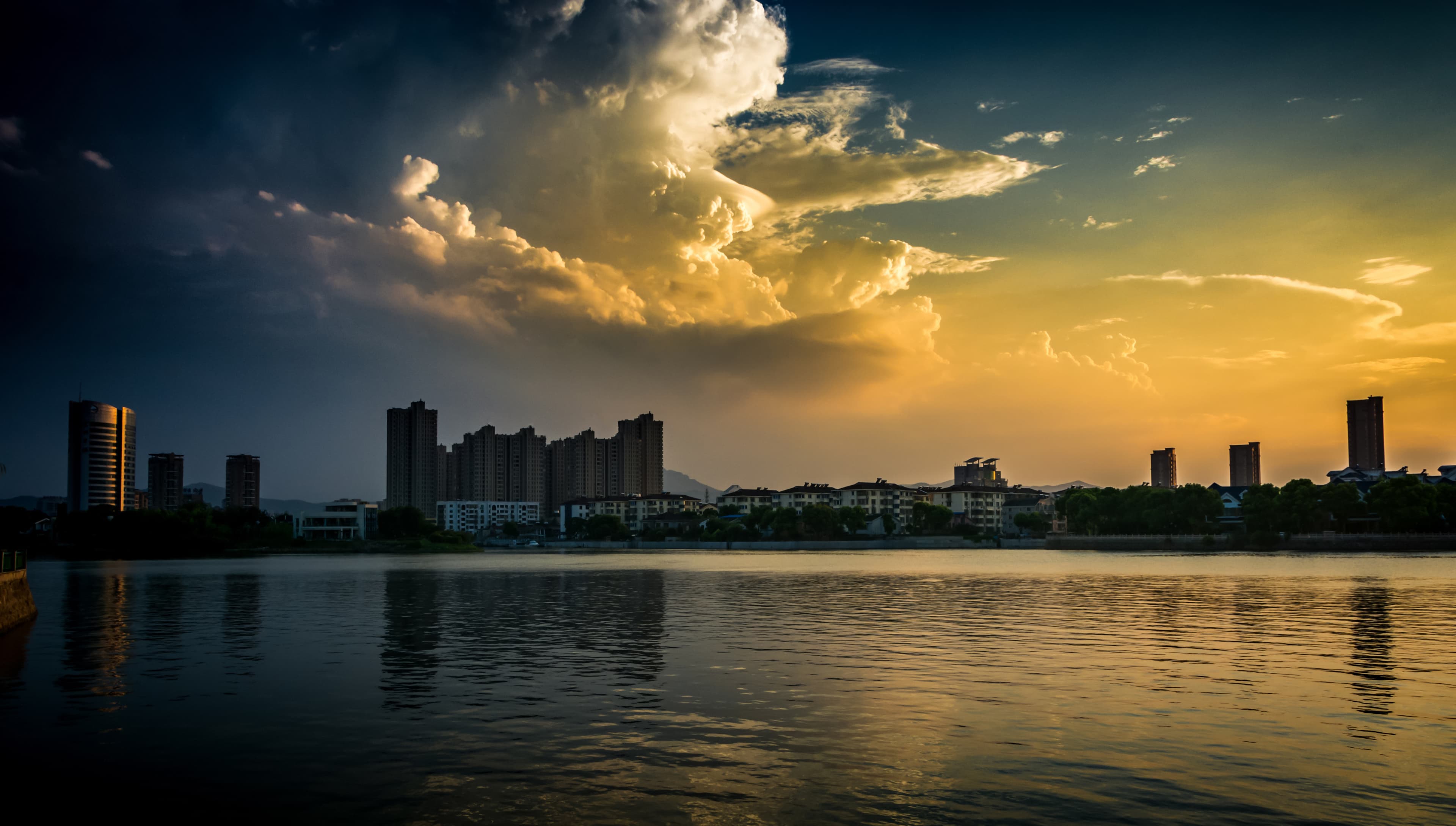 City skyline with modern high-rise buildings at dusk